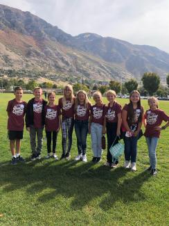 Canyon's student council pose in front of the mountains.