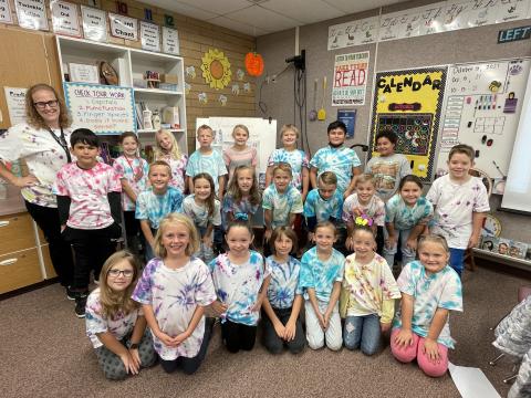 Miss Nuttall's class in their matching tie-dye tshirts.
