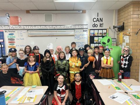 Mrs. Perschon's 4th grade class dressed up for Halloween