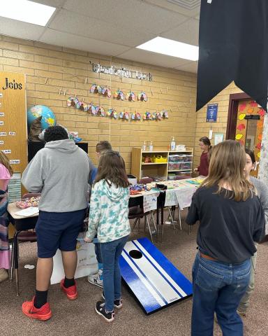 students selling and trading