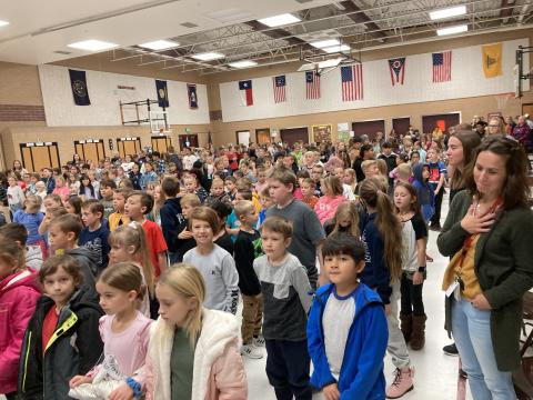 Students listening to local veterans