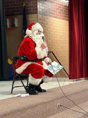 Santa reading to kids