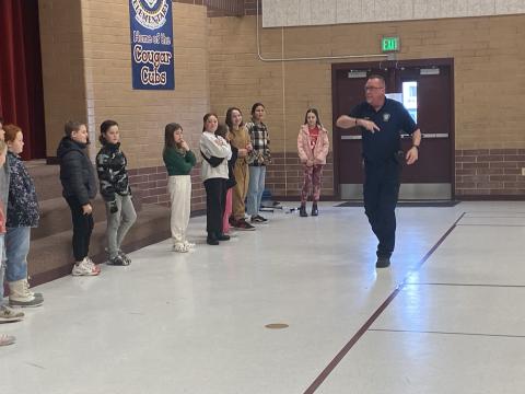 Officer Leifson teaching students