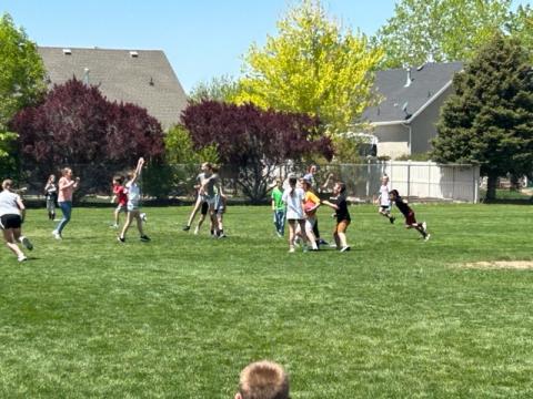 5th grade students catching ball