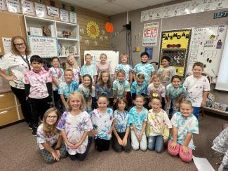 Miss Nuttall's class in their matching tie-dye tshirts.